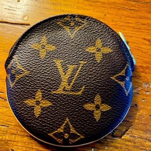 Louis Vuitton retired hard to find coin purse.